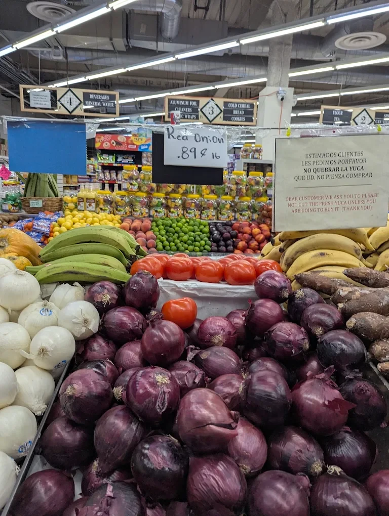 Produce and grocery aisles inside Daly City Market